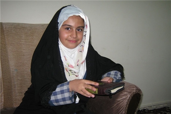 Iranian Girl Preparing for Good Performance at Dubai Int’l Quran Contest