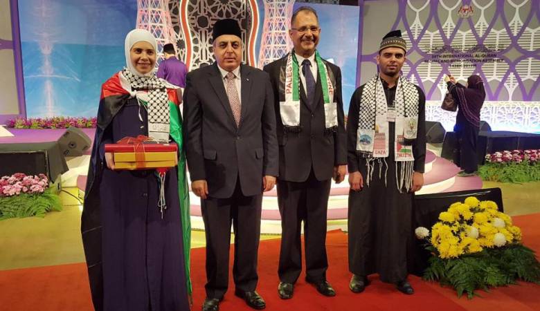 ملایشیاء کے خواتین قرآنی مقابلوں میں فلسطینی ڈاکٹر کی دوسری پوزیشن