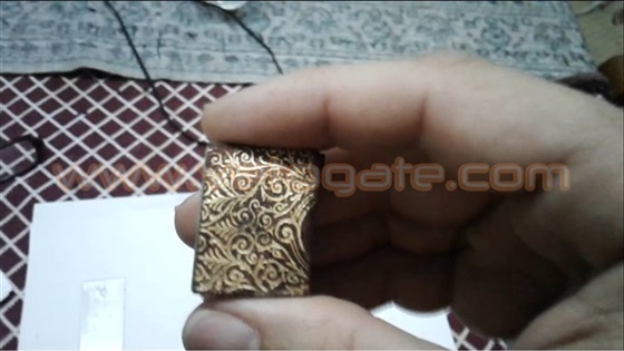 Egyptian Releases Photos of Miniature Quran Copy