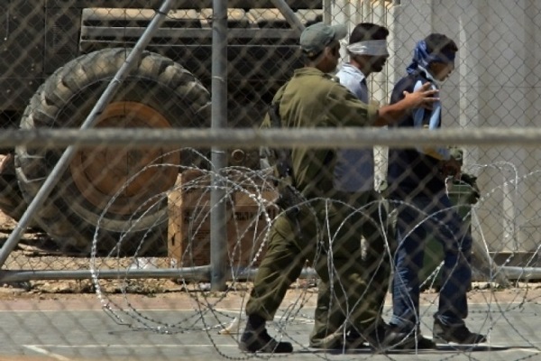 Palestinians detained by Israeli forces