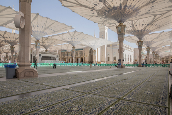 Courtyard of Prophet’s Mosque Covered with New Green Carpets