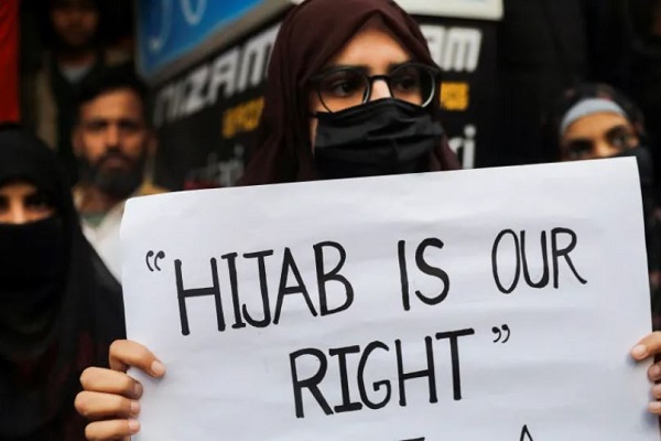Muslim girls defend right to wear hijab