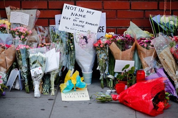 Flowers and messages left outside Finsbury Park Mosque are seen in the Finsbury Park area of north London on June 20, 2017, following a van attack (Image: TOLGA AKMEN/AFP via Getty Images)