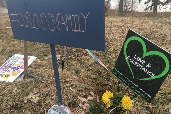 At the intersection where four members of the Afzaal family were killed on June 6, 2021, people dropped off flowers, signs and notes of condolence