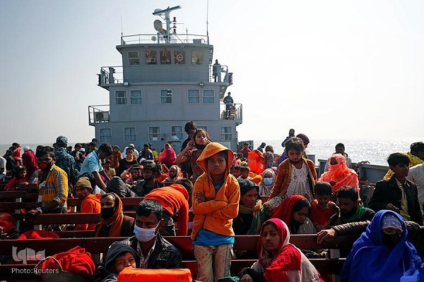 Photo shows scores of Rohingya Muslim families being moved to camps on remote island by Bangladesh in 2021