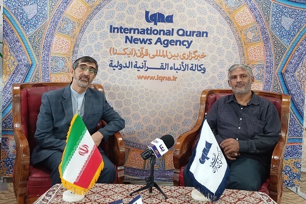 Professor Hikmatullah Babu Sahib (R) poses for a photo with Iranian cultural attaché in Malaysia Mohammad Karimi Oraei on the sidelines of Restu Global Quranic Arts Festival in Putrajaya on January 24, 2023. (Photo by IQNA)