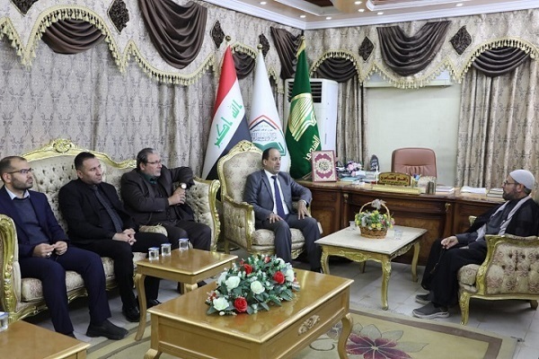 Sheikh Hassan al-Mansouri, the Quranic advisor to the Astan, meets with Rafi al-Ameri, director of the National Quranic Sciences Center