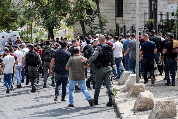 Israeli forces prevent Muslim worshippers from entering through the Lions' Gate
