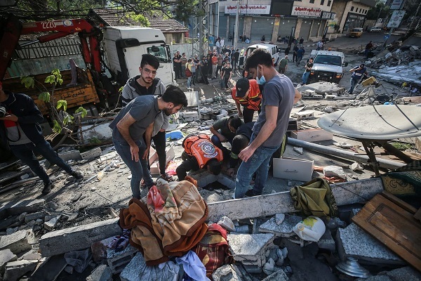 Horrific & Appalling: Israeli Jets Target Two Schools in Gaza, Kill over 200 Palestinians