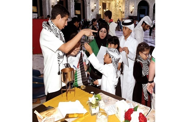 Qatari children taking part in the ‘Al-Quds; My Identity’ Campaign