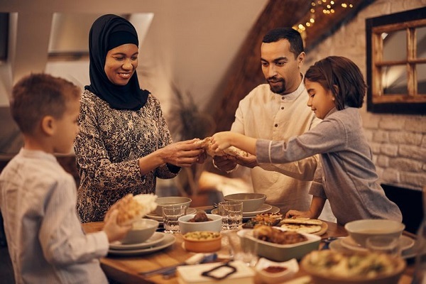 Muslim family breaking their fast