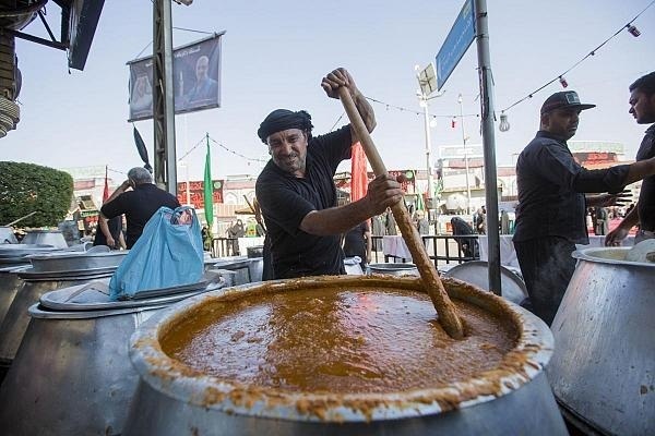 Votive food being prepared for those attending Muharram mourning rituals