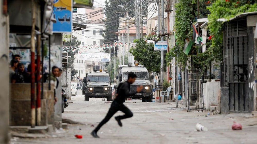 Five Palestinians Injured after Israeli Forces Raid Camp in West Bank