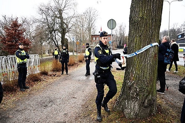Swedish police at a scene where a man plans to desecrate Quran in Stockholm