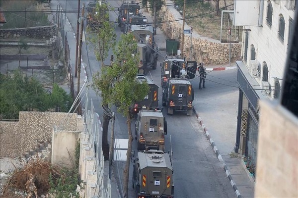 Israeli forces demolish the house of Palestinian prisoner Islam al-Farouh by planting explosives in Ramallah, West Bank on June 8, 2023