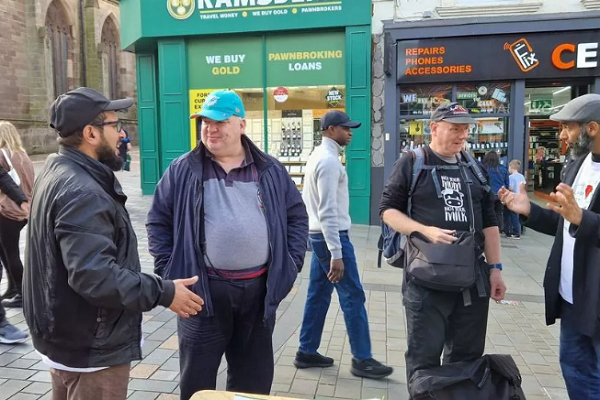 Muslims in Derby, England, talking to people about Islam