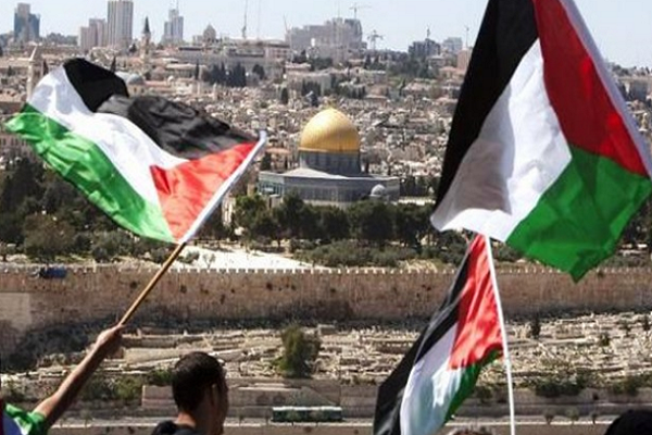 Palestinian flags in al-Quds