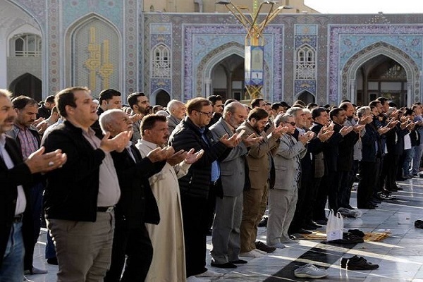 Pilgrims saying prayers at Imam Reza (AS) holy shrine