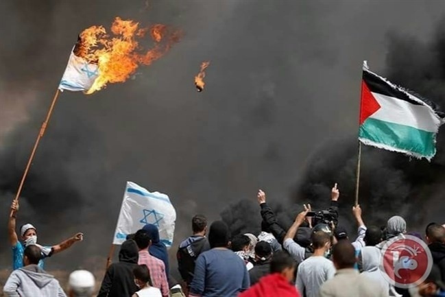 Iraqi demonstrators burn the flags of Israel, the US and the UK in rallies on November 15, 2024.