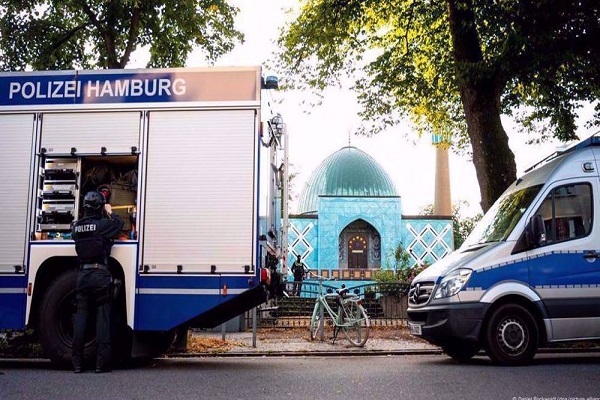 This image shows German police presence at the iconic Blue Mosque in the Islamic Center of Hamburg, Germany. The centre was raided and closed in July 2024.