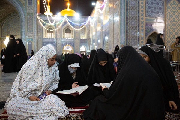 Women taking part in Itikaf rituals at a holy shrine in Iran