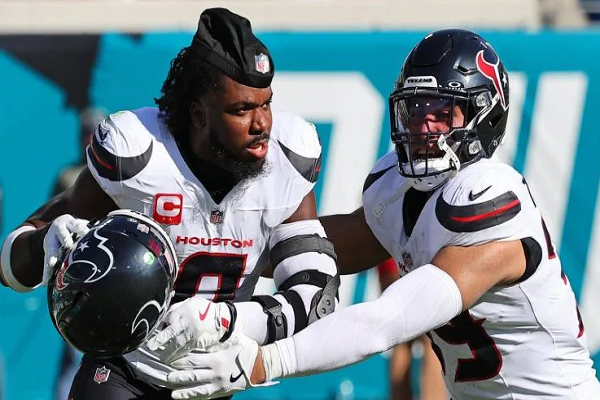 NFL player Azeez Al-Shaair (L)