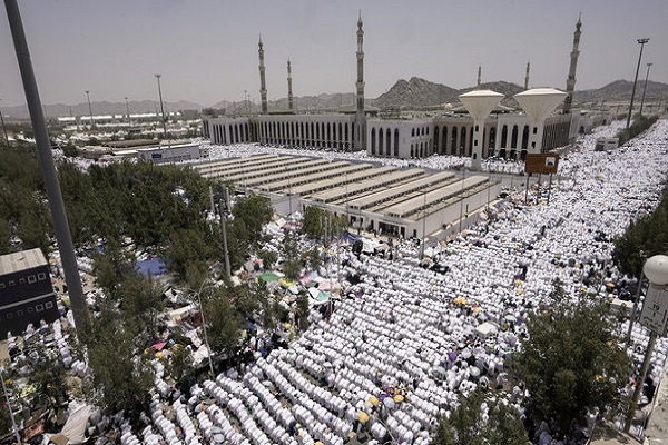Muslim pilgrims pray outside Namira Mosque in Arafat on the second day of the annual Hajj pilgrimage near the holy city of Mecca, June 27, 2023