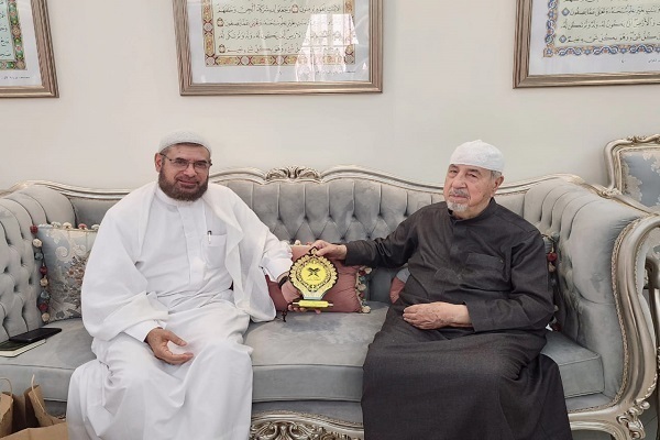 Uthman Taha (right) named the Quranic personality of the year