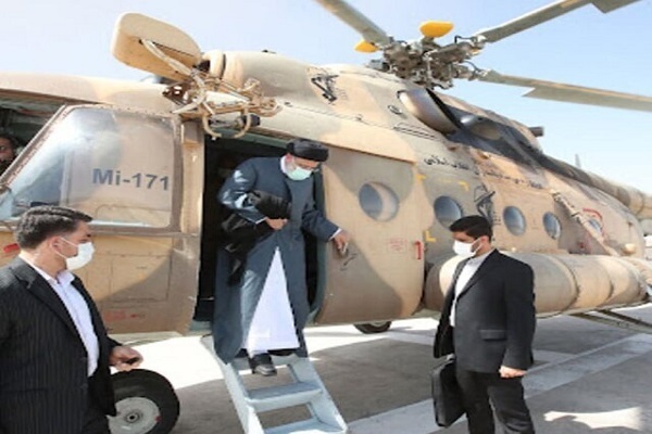 Iranian president Ebrahim Raeisi getting out of a helicopter