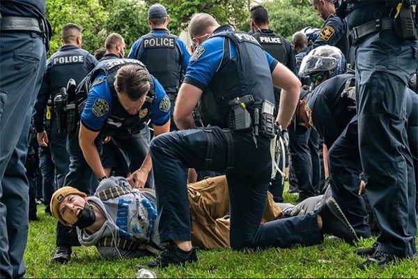 US police arresting a student at a pro-Palestinian rally