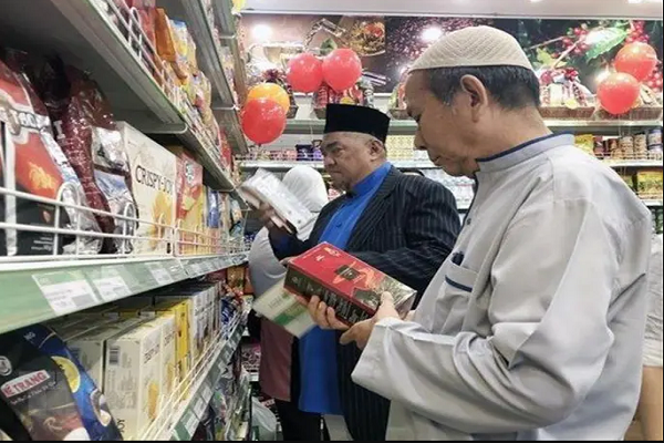 Customers shop at a halal-certified store in Ho Chi Minh City.