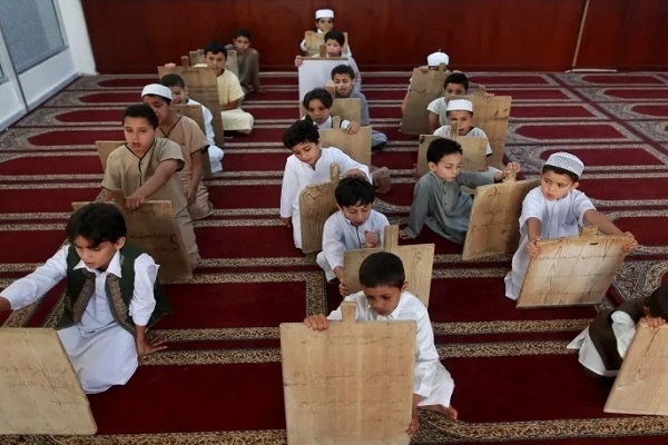 Children learning the Quran in Morocco