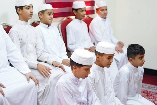 Teenagers taking courses as part of Amir al-Qurra Quranic plan in Iraq
