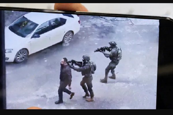Israeli regime forces using a Palestinian as human shield