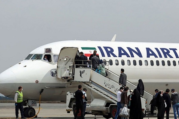 Passengers boarding an Iran Air plane