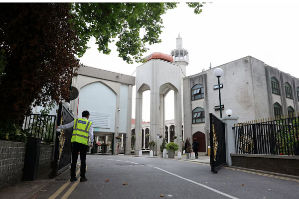 A security guard stands at London Central Mosque in Regent's Park, in London, Britain, August 5, 2024