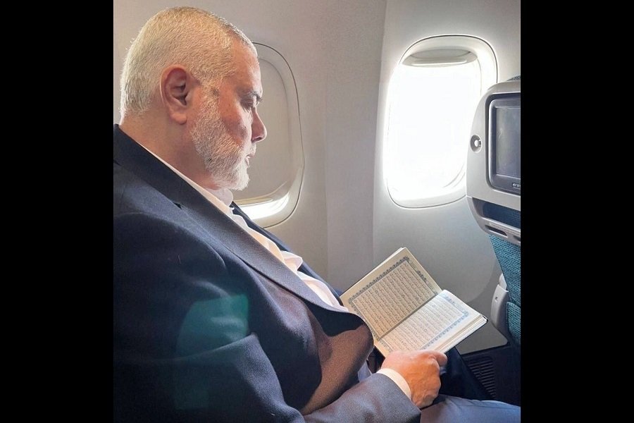 Hamas Political Bureau Chief Ismail Haniyeh reading the Quran