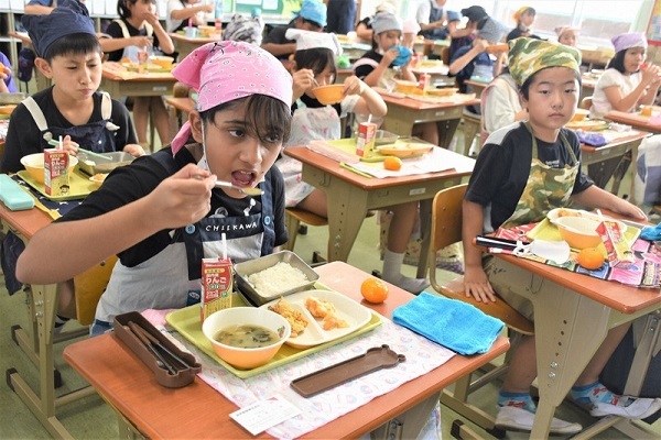 Students enjoy a halal school lunch at an elementary school in Sakai, Ibaraki Prefecture of Japan, on Sept. 4, 2024.