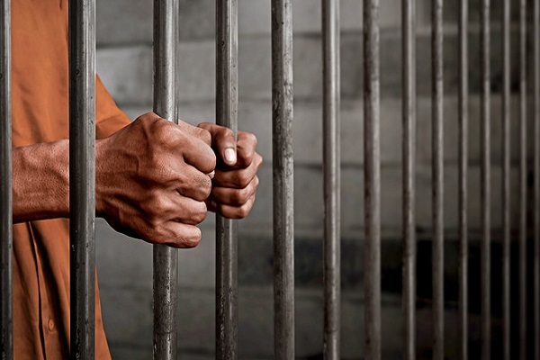A man behind bars