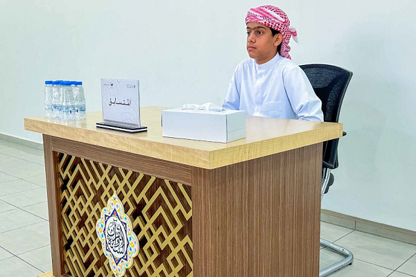 A contestant in the 27th edition of the Sharjah Noble Quran and Sunnah Award