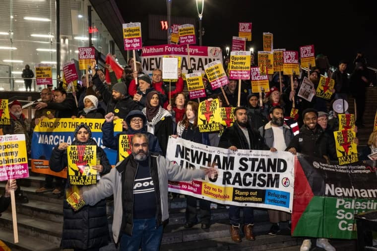 A protest in Stratford following mosque attacks in London