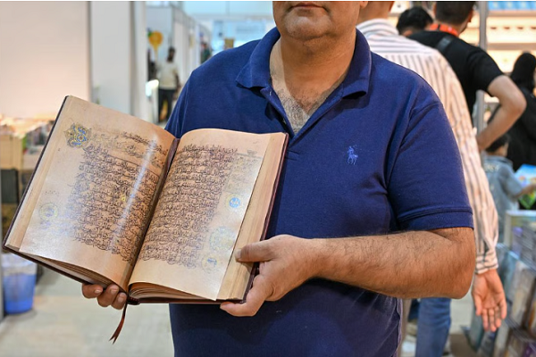 Millennium-Old Quran Manuscript Reborn at Int’l Book Fair