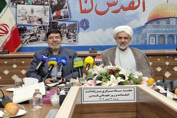 Head of the Intifada and Quds Day Headquarters Brigadier General Ramezan Sharif (left) speaking at a press conference in Tehran on February 17, 2025.