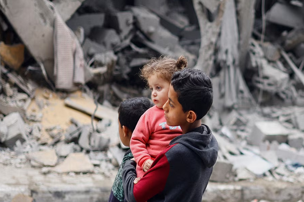 Children in Gaza amid destruction