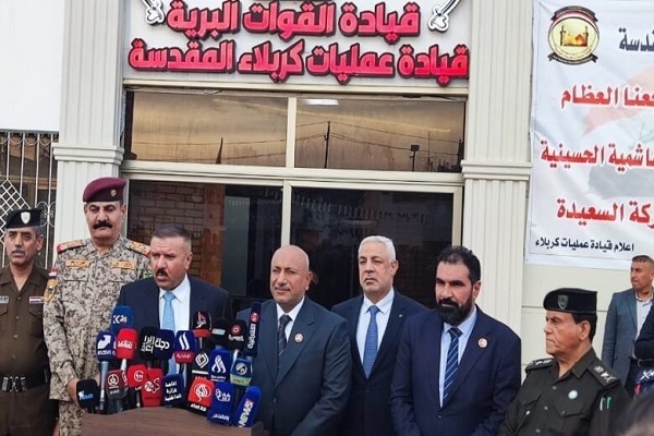 Iraqi Minister of Interior Abdul Amir al-Shammari speaking in a press conference with the governor of Karbala and security commanders