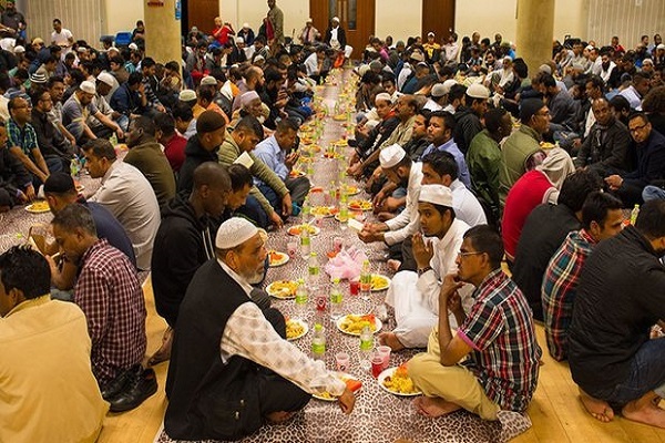Muslims breaking their fast together in Ramadan