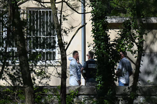 Members of the forensic police at the La Grande Combe mosque where a Muslim worshipper was stabbed to death, April 25, 2025 in the Gard region of France.