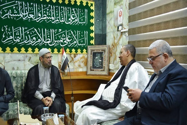 Sheikh Hassan al-Mansouri, the Quranic affairs advisor of the Astan (custodianship) of Imam Hussein (AS) holy shrine met with Sharif Muhammad Ali Haidara, the president of al-Muzdahar International Quranic Foundation of Senegal