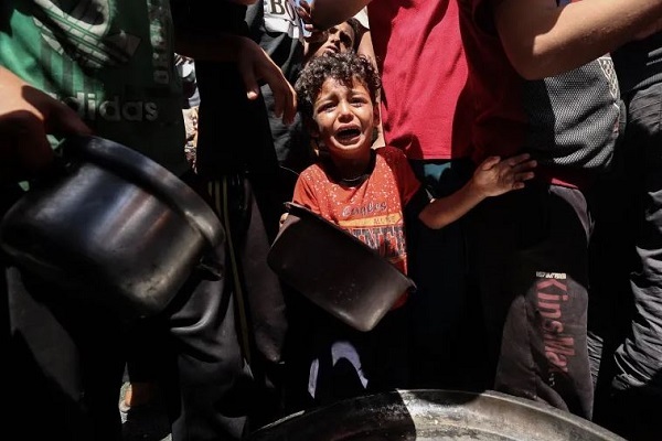 Israeli Airstrikes Kill 76 in Gaza as Aid Blockade Fuels Starvation Crisis