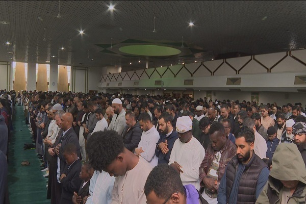 Muslims observing Eid al-Adha prayers at a mosque in Scotland.